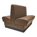 A brown leather QA Group double back booth with a black base.