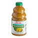 A bottle of Dr. Smoothie Classic Pineapple Blend fruit smoothie mix with a green cap.