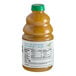 A close-up of a bottle of Dr. Smoothie Classic Pineapple Blend fruit smoothie mix with a brown label.