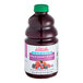 A bottle of Dr. Smoothie Classic Four Berry Blend fruit smoothie mix with a label.