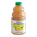 A close up of a Dr. Smoothie Classic Lemonade bottle with a green lid.