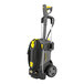 A Karcher electric pressure washer with a yellow hose.