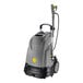 A grey and black Karcher upright hot water pressure washer with a handle.