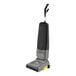 A Karcher Sensor BP cordless upright vacuum cleaner with a yellow and grey handle.