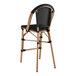A Lancaster Table & Seating black counter height outdoor barstool with a black seat.