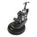 A Karcher commercial floor burnisher with a black surface and white body and a handle.