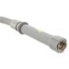 A grey T&S flex hose with a metal tube and plastic liner.