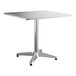 A Lancaster Table & Seating square table with a metal base.