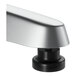 A close-up of a Lancaster Table & Seating chrome square table base with a round base.