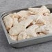 A tray of frozen Brakebush Farm Pantry boneless skinless halal chicken tenders.