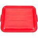 A red rectangular Vollrath Traex food storage box lid with white lines.