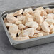A tray of frozen Brakebush Farm Pantry boneless skinless halal chicken breast chunks.