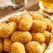 A basket of Imposter Dairy-Free Vegan Jalapeno Bites.