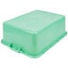 A green Vollrath Traex plastic drain box.