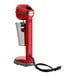 A red AvaMix single spindle drink mixer with a silver spindle.