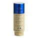 A close up of a Lindt Squeezable Hazelnut Chocolate Spread bottle with a blue cap.