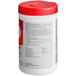 A white container of WipesPlus No-Rinse Sanitizing Wipes with a red lid and black text.