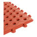 A red rubber connectable floor mat with a diamond pattern and circular holes, designed for grease resistance and anti-fatigue use.