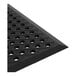 A black heavy-duty rubber anti-fatigue floor mat with a diamond pattern, round holes, and a beveled edge.