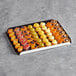 A White Toque tray with various petits fours on it.