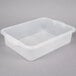 A Vollrath Traex Color-Mate clear plastic drain box with a handle on a white background.