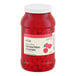 A large plastic jar of Hometown Provisions maraschino cherries without stems.