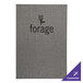 A grey fabric menu cover with black text on it.
