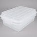 A white Vollrath plastic container with a snap-on lid.
