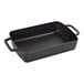 A black rectangular Staub baking dish with handles.