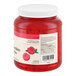 A large plastic jar of Regal maraschino cherry halves with a white lid.