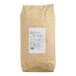 A brown bag with a white label that reads "Lotus Foods Regenerative Organic Long Grain Brown Basmati Rice"