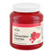 A large plastic jar of Hometown Provisions crushed maraschino cherries.