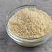 A bowl of Lotus Foods long grain white basmati rice on a table.
