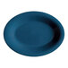 A Texas Blue oval platter with a speckled surface and dark blue rim.