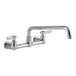 A Krowne Silver Series wall-mount faucet with lever handles and a swing nozzle.