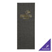 A black fabric menu cover with gold text on it.