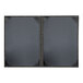 Two black rectangular H. Risch, Inc. menu covers with a black leather binding.