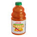 A close up of a bottle of Dr. Smoothie Organic Mango Fruit Smoothie Mix on a table.