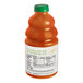 A bottle of Dr. Smoothie Organic Mango Fruit Smoothie Mix with a label.