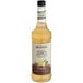 A bottle of Monin Zero Calorie Natural Vanilla Flavoring Syrup with a white label.