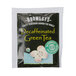 A black package of Bromley Exotic Green Decaffeinated Tea with a green and white label.