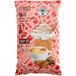 A white bag of The Frozen Bean Spiced Chai Tea Latte Mix with a picture of a cup of chai tea.