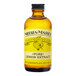 A Nielsen-Massey bottle of Pure Lemon Extract on a counter.