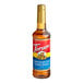 A Torani Chocolate Chip Cookie Dough flavoring syrup 750 mL plastic bottle filled with brown liquid.
