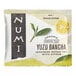 A package of Numi Organic Yuzu Bancha Tea Bags with a close up of a lemon.