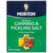A case of 9 boxes of Morton Canning and Pickling Salt on a grocery store shelf.