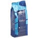 A blue bag of Lavazza Dek decaf whole bean espresso coffee.