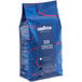 A blue bag of Lavazza Gran Espresso whole bean coffee with red and white text.