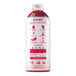 A white bottle of Smartfruit Wild Watermelon Puree with red labels.