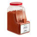 A white container of Regal Extra Hot Ground Cayenne Pepper.